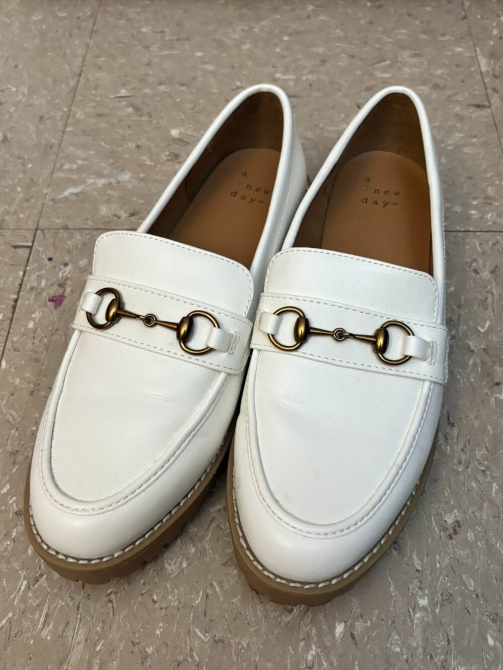 Danica model white loafers with gold-toned horsebit